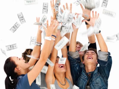 Happy people celebrating with money raining